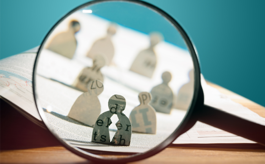 Identifying high value recruits - magnifying glass paper cutouts